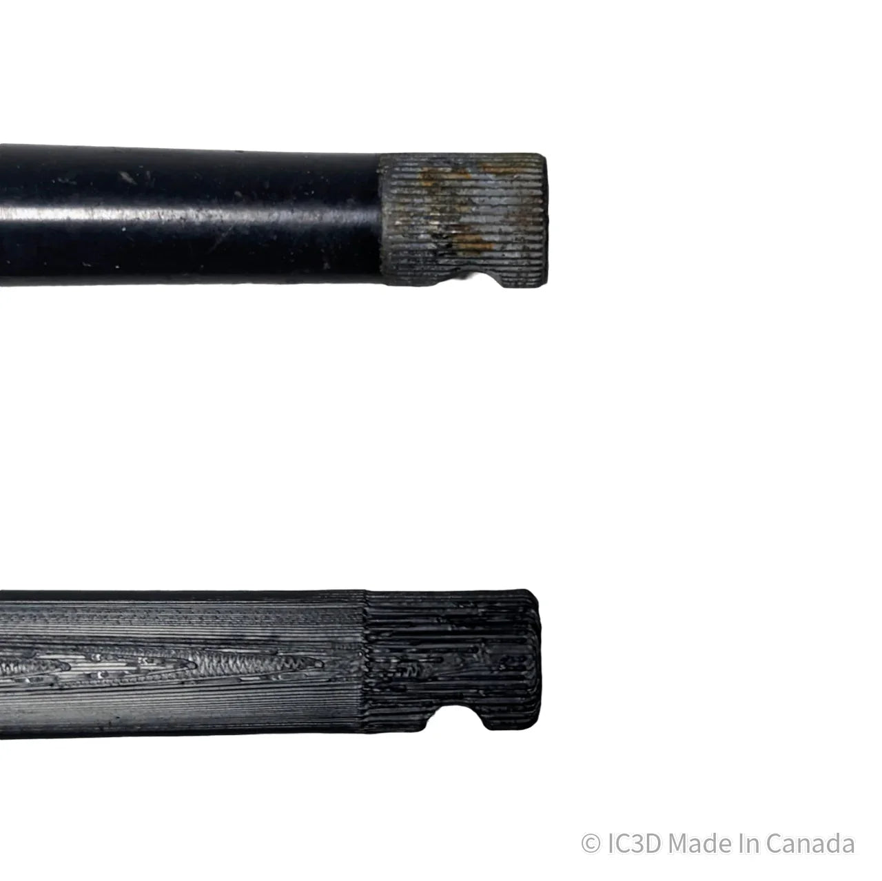 Comparison of black metal rod and 3D printed part with textured ends on white background
